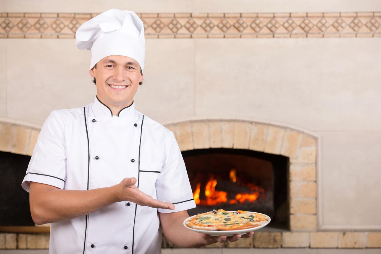 Chef preparing a flavorful meal with fresh produce